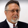 Mr. Andrew (Gene) Mills